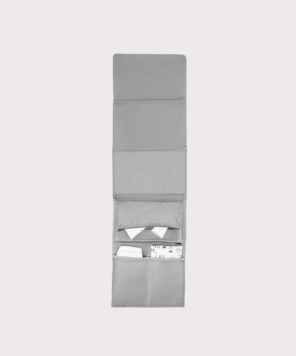 Dagne Dover Joey Changing Kit in grey unfolded, revealing the detachable changing mat.
