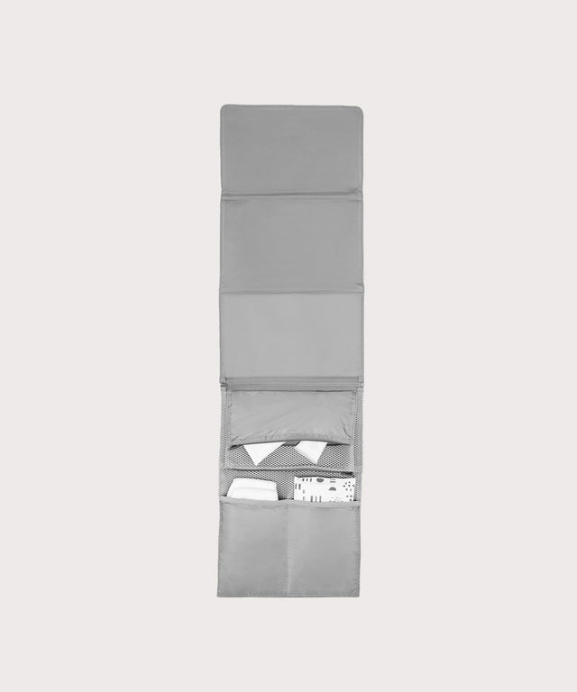 Dagne Dover Joey Changing Kit in grey unfolded, revealing the detachable changing mat.
