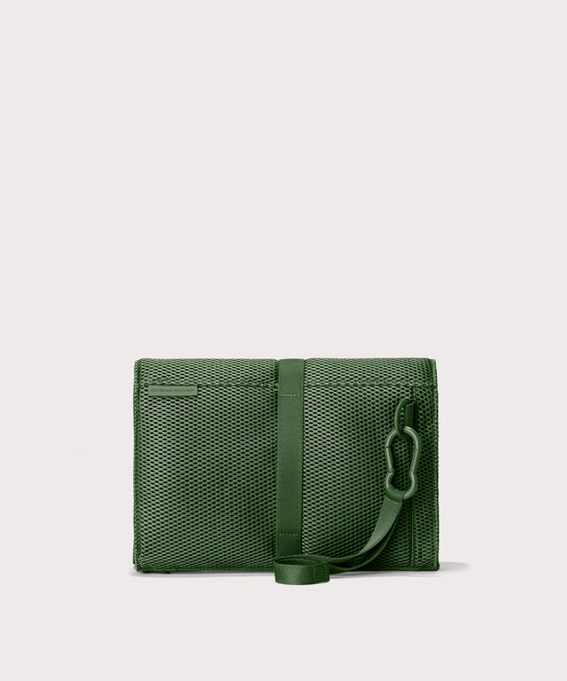 Dagne Dover Joey Changing Kit in a rich, classic forest green seen from the back.
