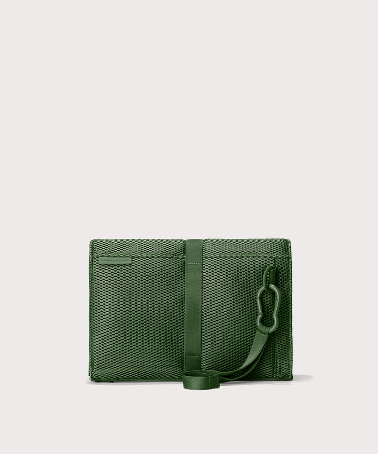 Dagne Dover Joey Changing Kit in a rich, classic forest green seen from the back.
