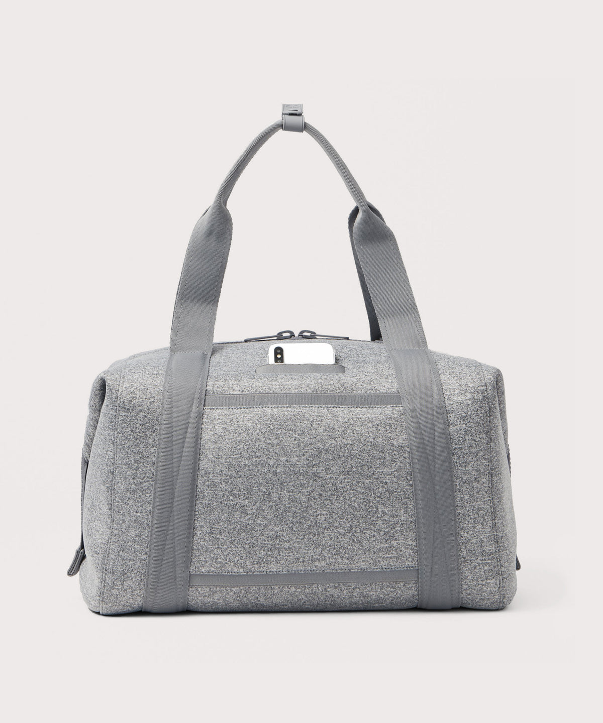 Large Landon Carryall in grey, displaying an exterior phone pocket
