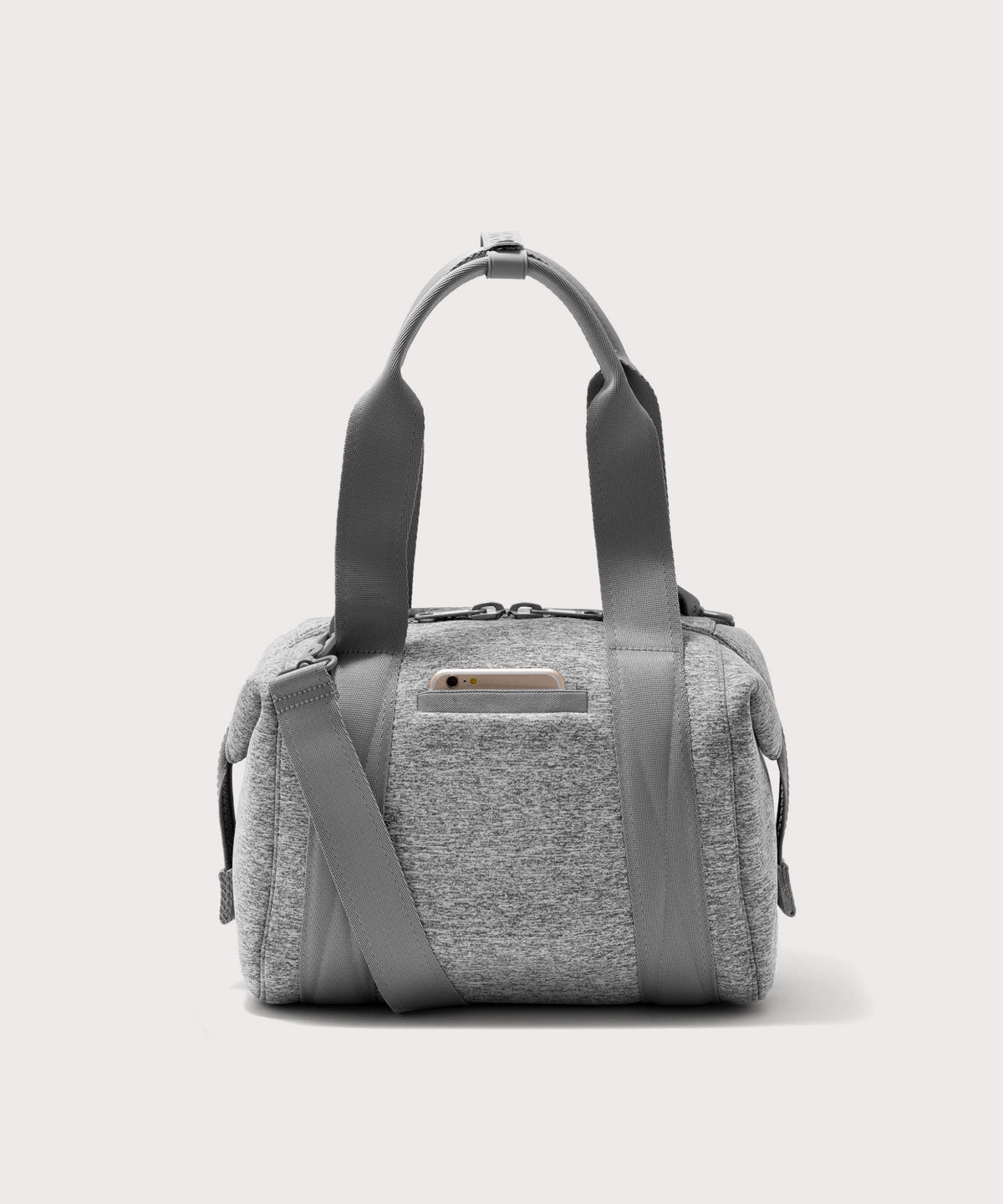 small Landon Carryall in grey, displaying an exterior phone pocket
