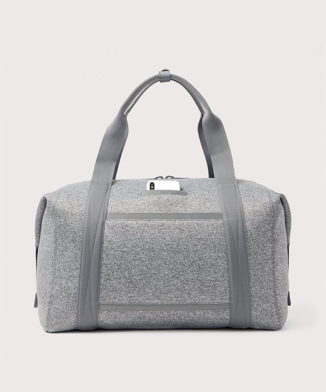 extra large Landon Carryall in grey, displaying an exterior phone pocket
