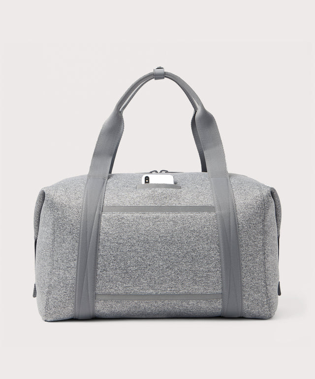extra large Landon Carryall in grey, displaying an exterior phone pocket

