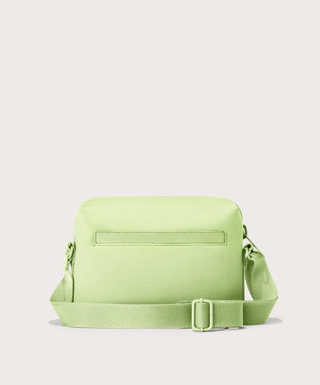 Dagne Dover Micah Crossbody in matcha seen from the back.
