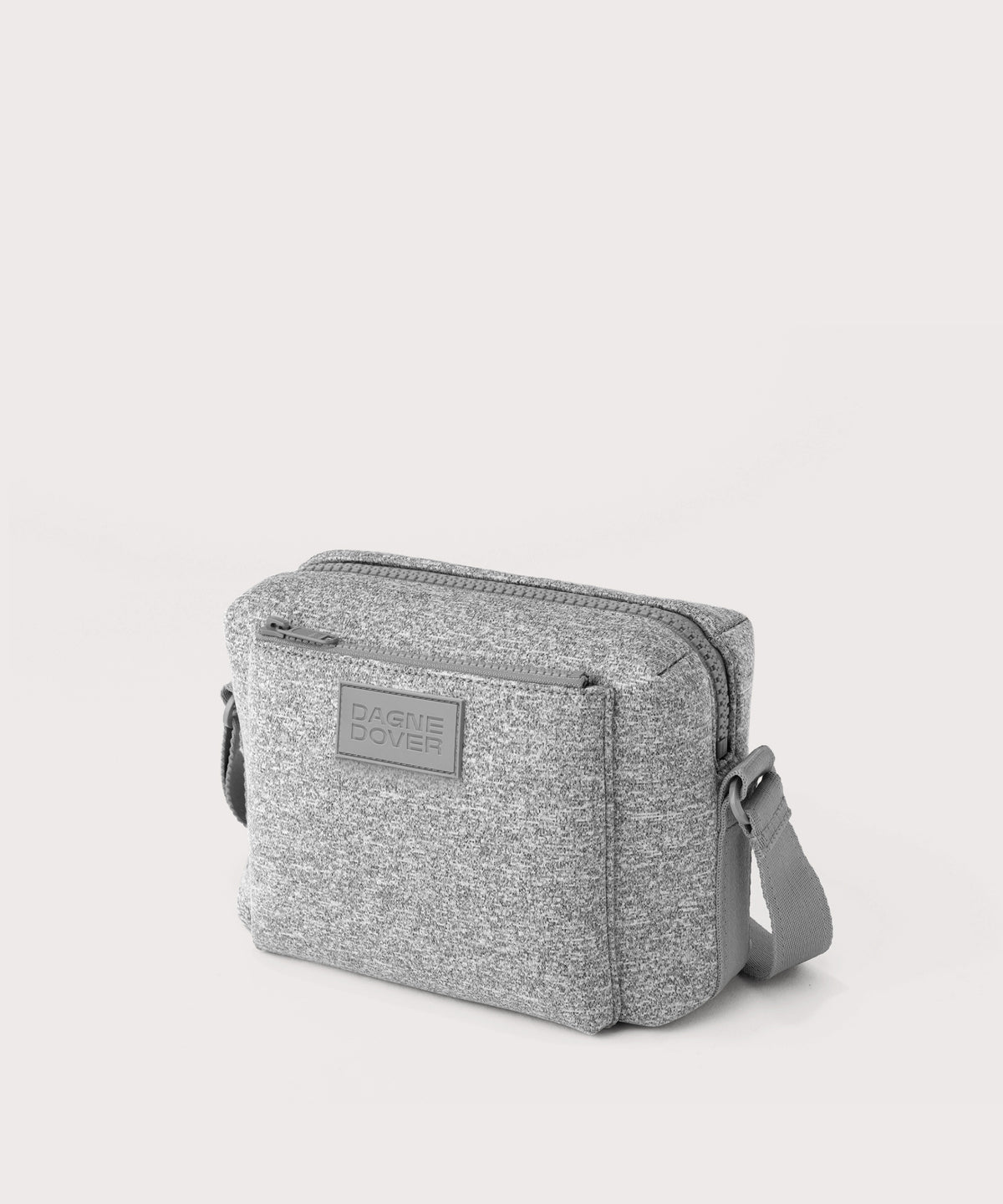 Dagne Dover Micah crossbody in grey seen from an angle.

