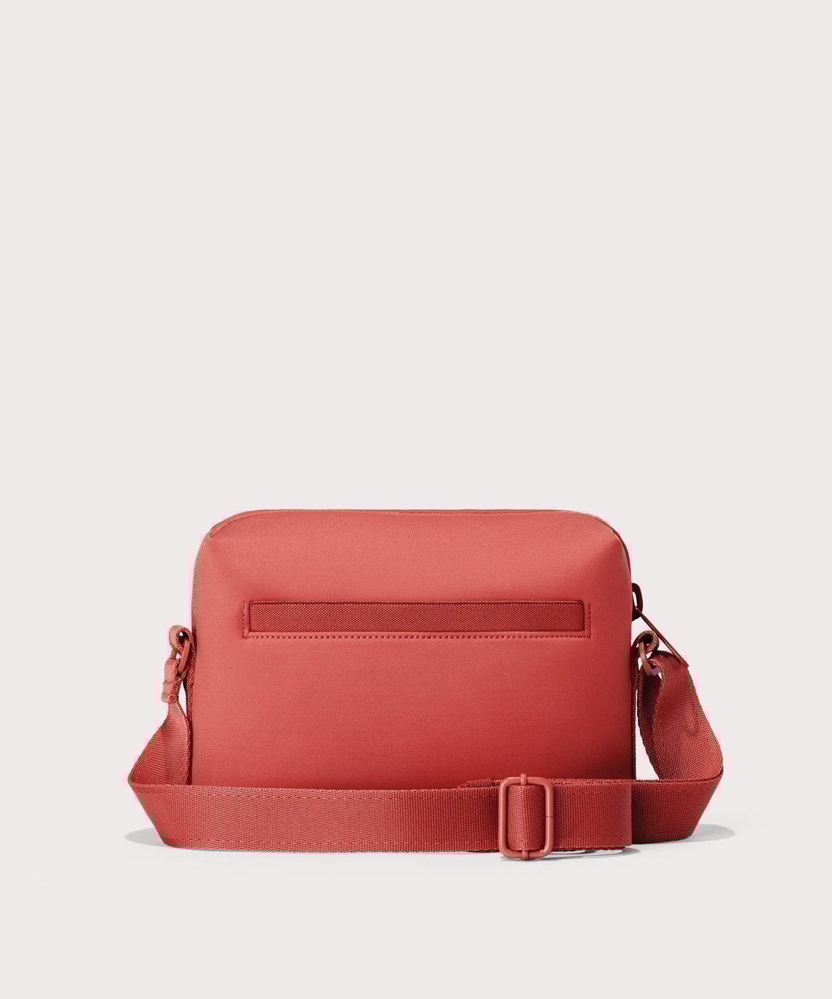 Dagne Dover Micah Crossbody in a poppy, vintage wash red seen from the back.
