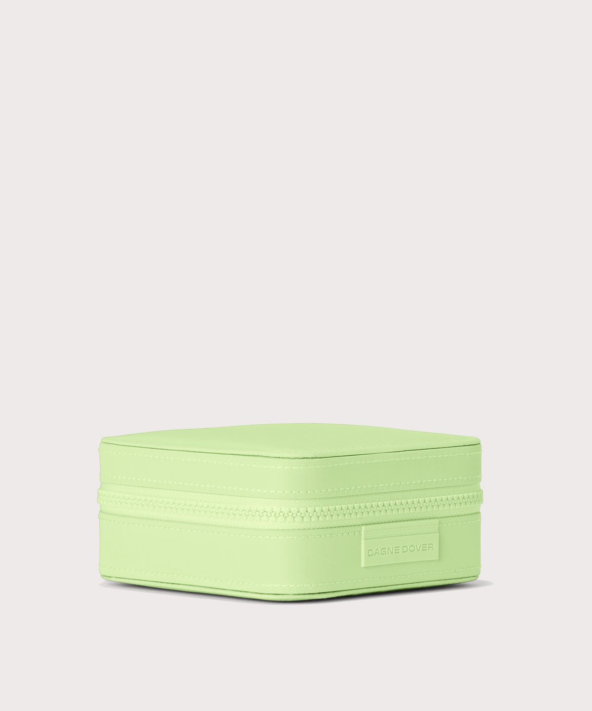 Dagne Dover Large Frankie Jewelry Case in matcha green seen from the side.
