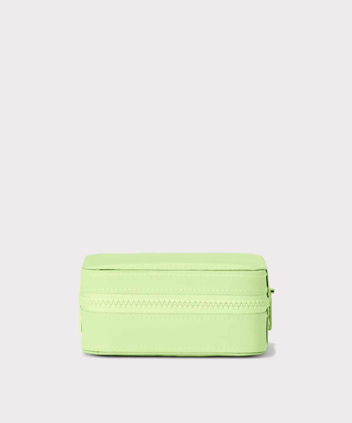 Dagne Dover Large Frankie Jewelry Case in matcha green seen from a side.
