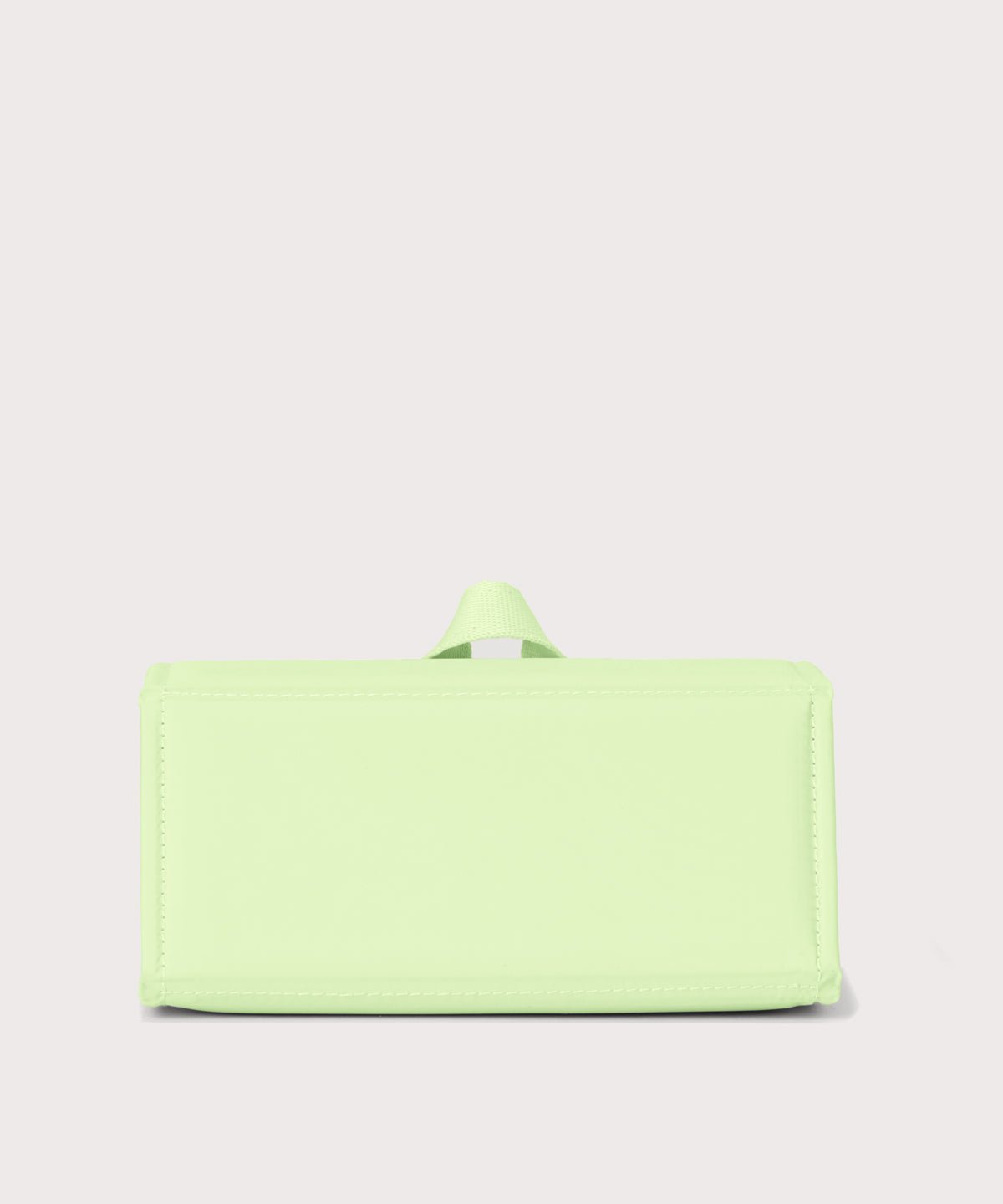 Dagne Dover Remi foldable glasses holder in matcha green seen from the back.
