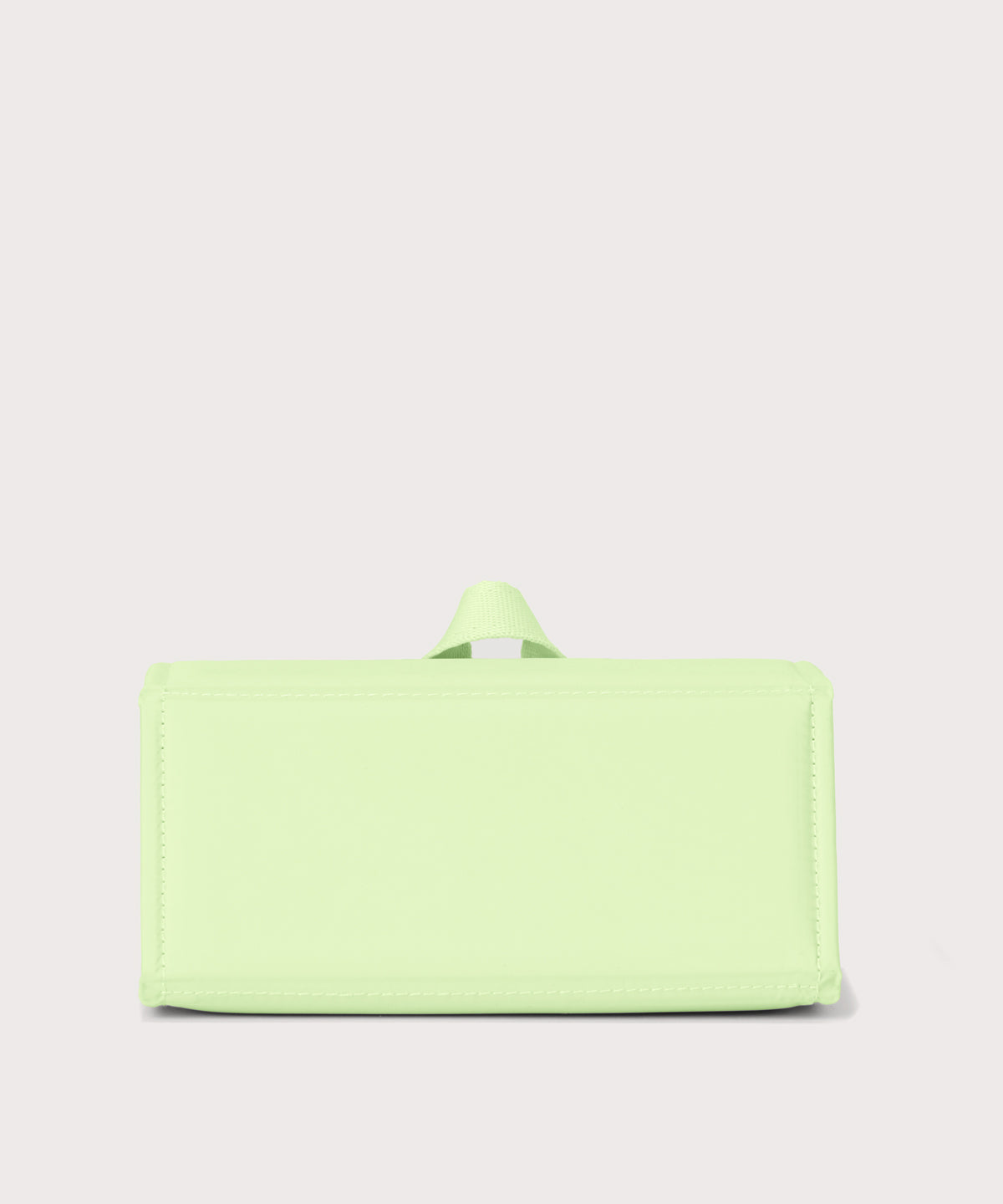 Dagne Dover Remi foldable glasses holder in matcha green seen from the back.
