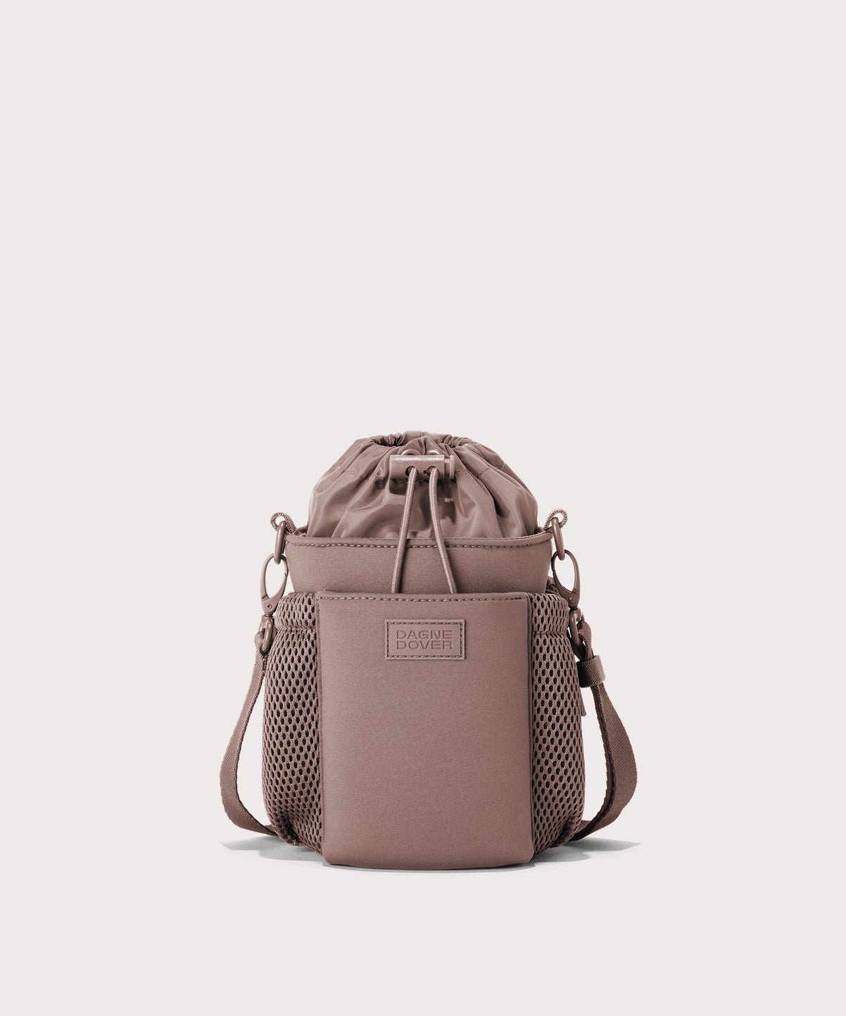 Dagne Dover Sloan Water Bottle Sling in pink.
