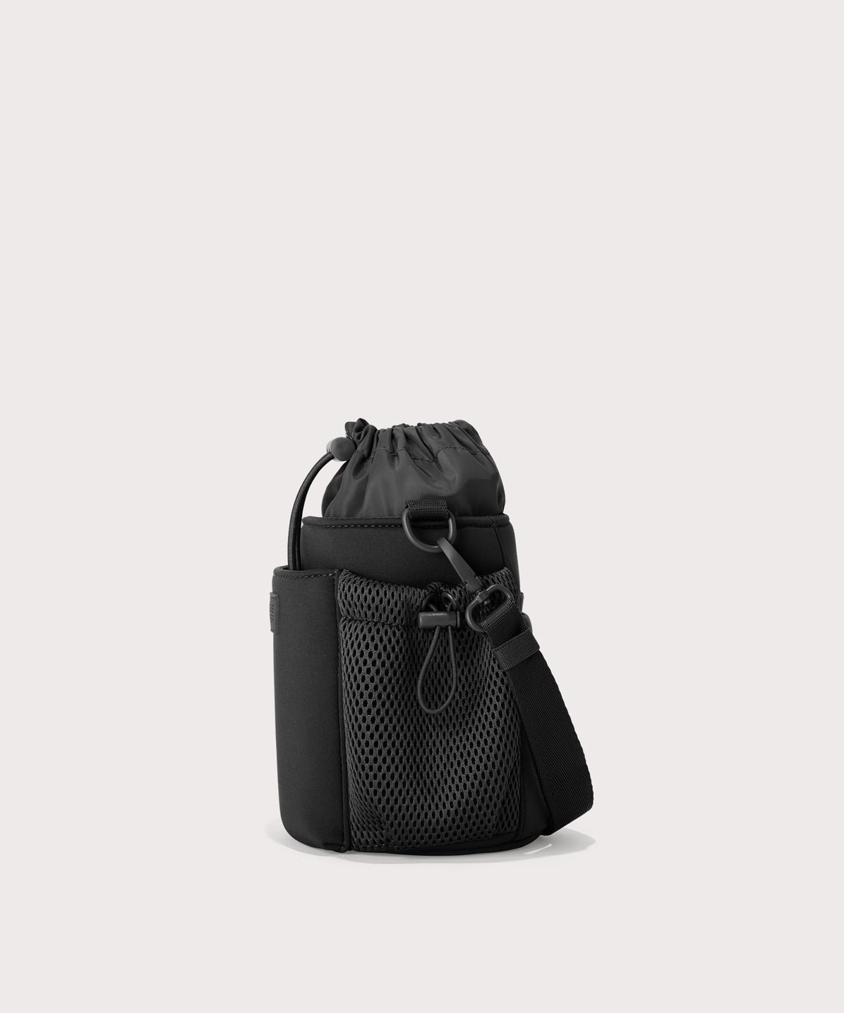 Dagne Dover Sloan Water Bottle Sling in black seen from the side.
