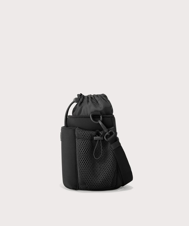 Dagne Dover Sloan Water Bottle Sling in black seen from the side.
