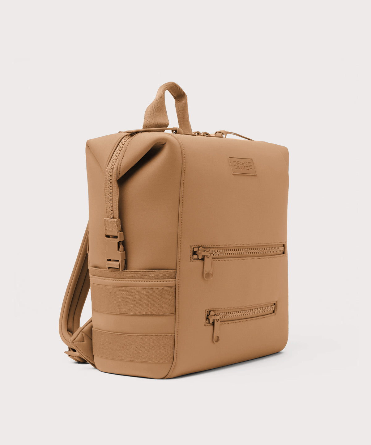 Dagne Dover Large Indi Diaper Backpack in camel brown seen from an angle.
