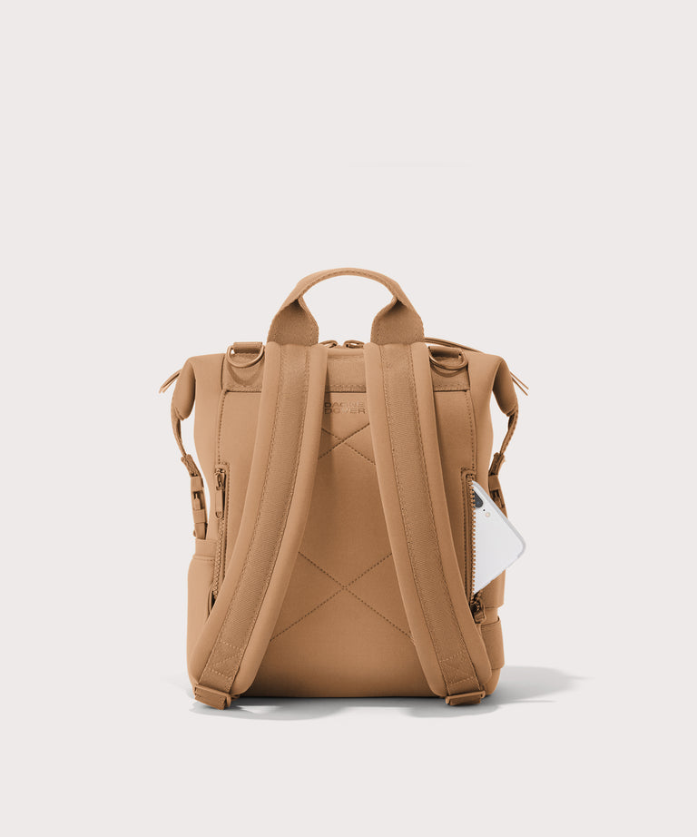 Dagne Dover small Indi Diaper Backpack in camel brown seen from the back.

