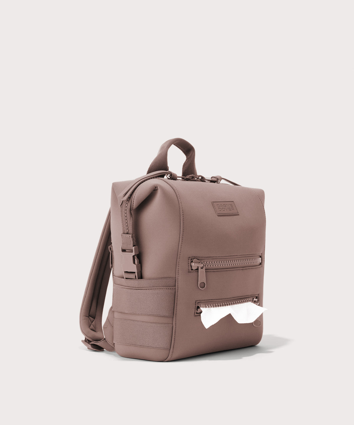 Dagne Dover small Indi Diaper Backpack in pink showing the zipper opening for easy access wipes.
