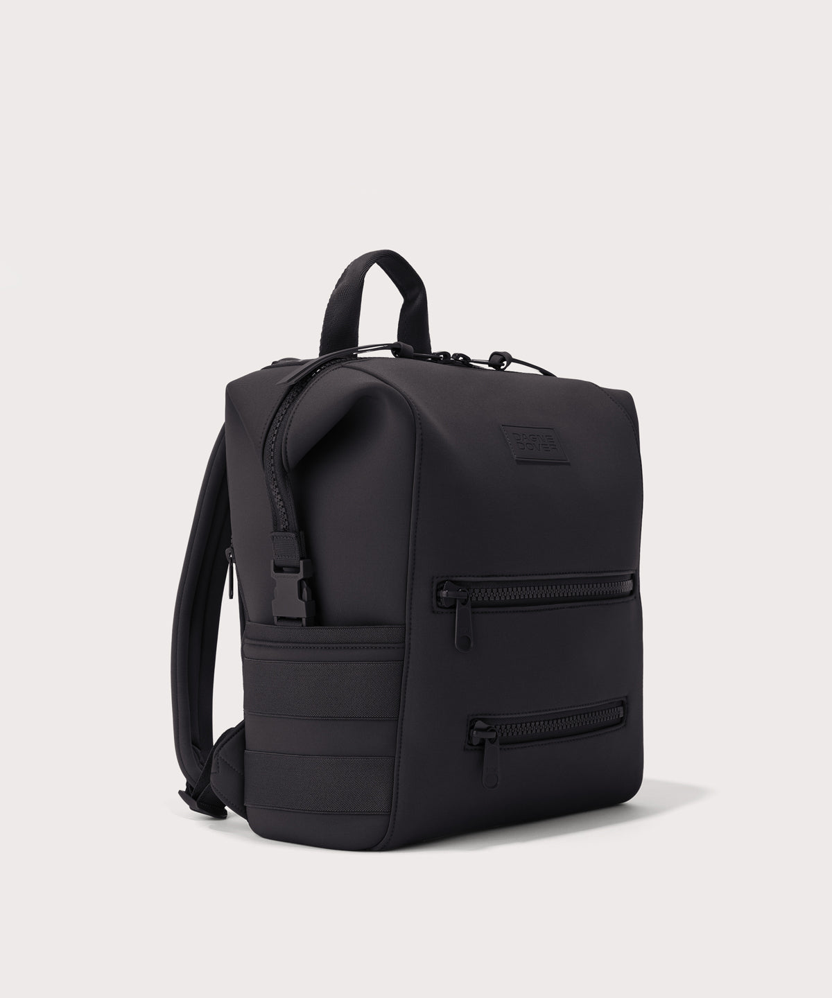 Dagne Dover medium Indi Diaper Backpack in black seen from an angle.
