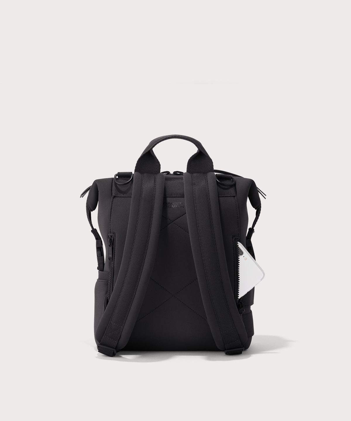 Dagne Dover small Indi Diaper Backpack in black seen from the back.
