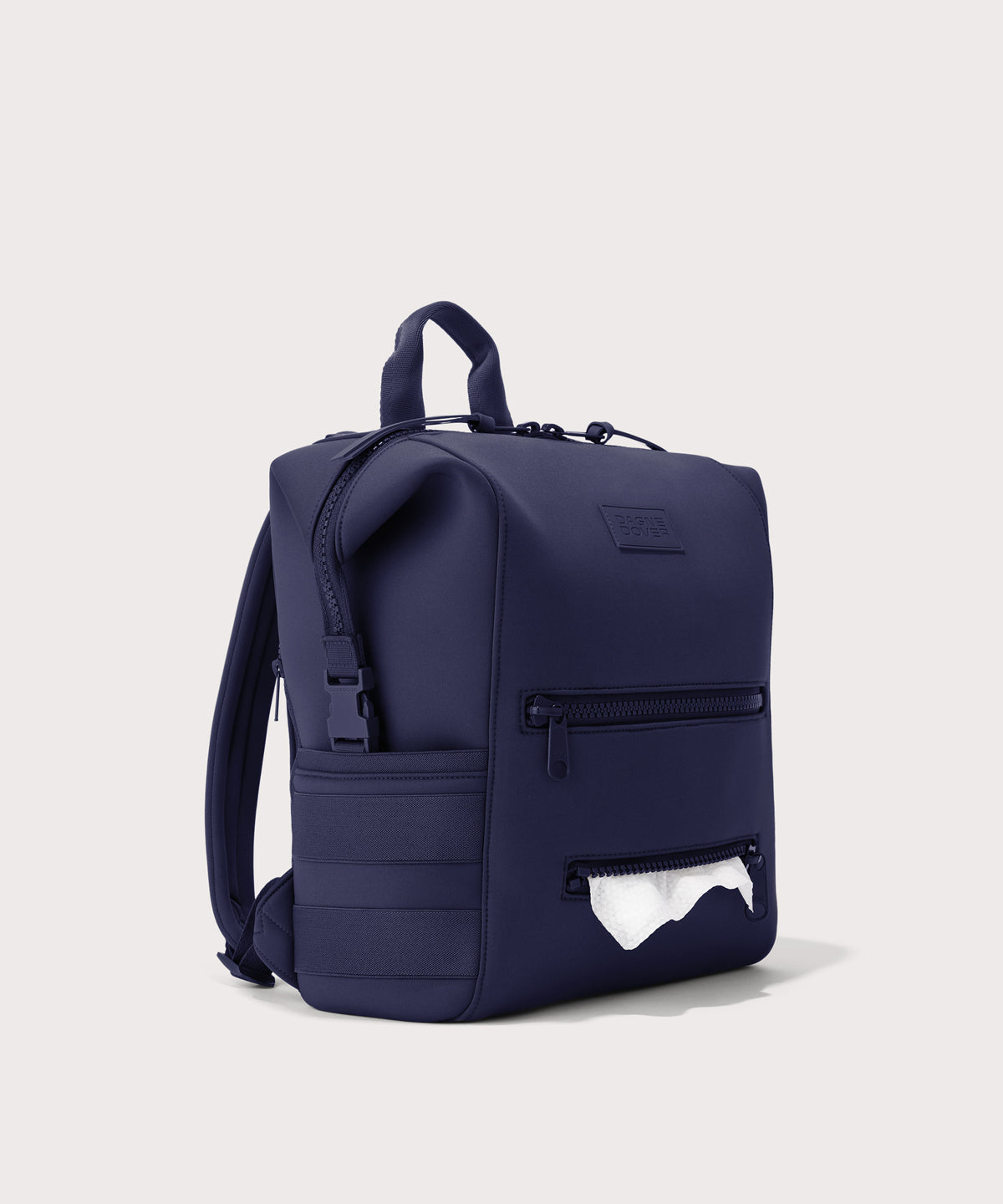 Dagne Dover Medium Indi Diaper Backpack in dark blue showing the zipper opening for easy access wipes.
