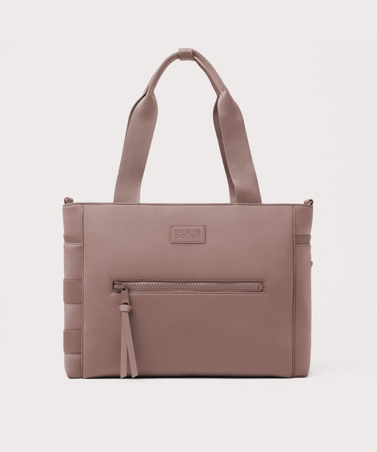 Dagne Dover large Wade Diaper Tote in pink with the shoulder strap removed.
