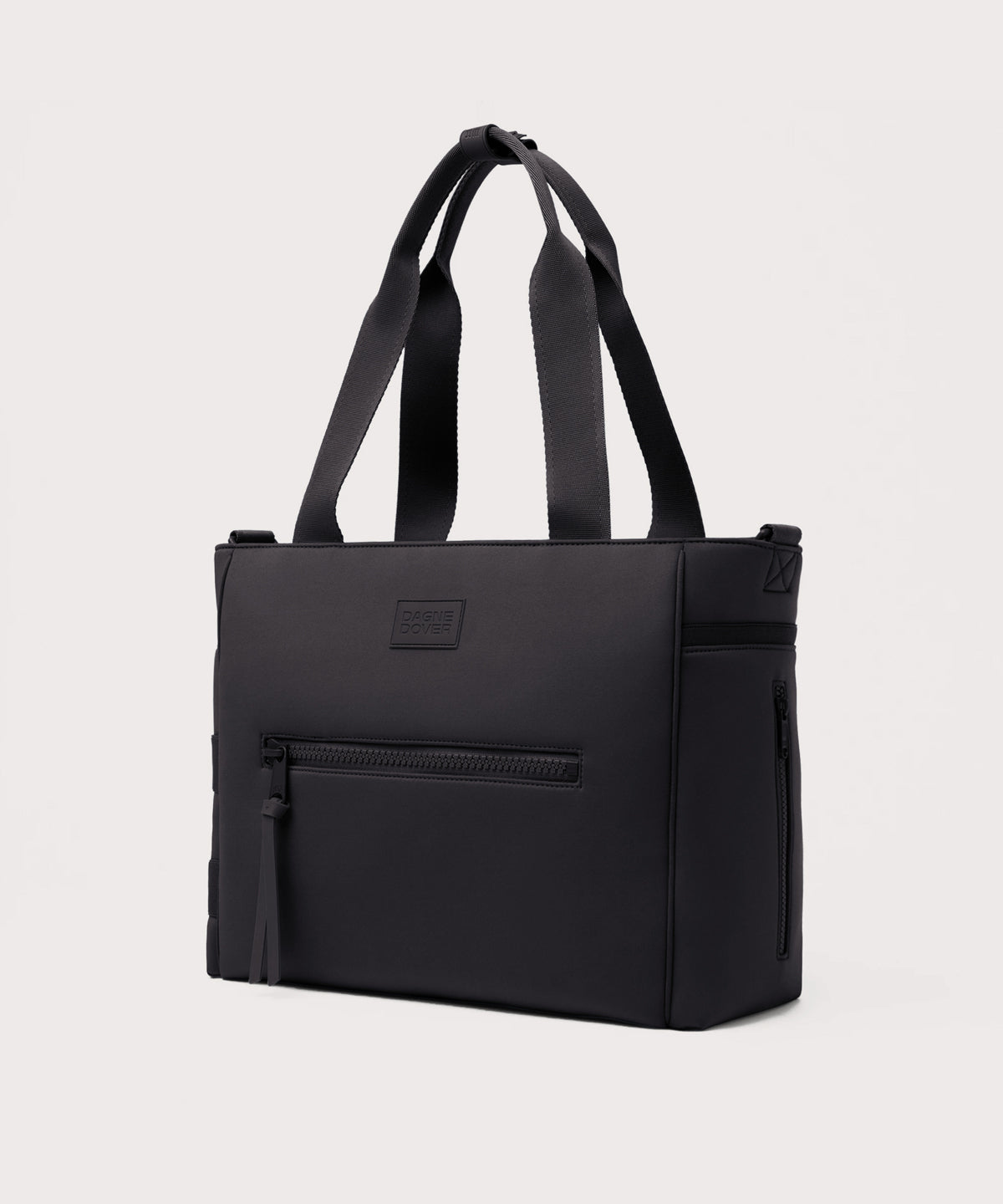 Dagne Dover large Wade Diaper Tote in black seen from an angle.
