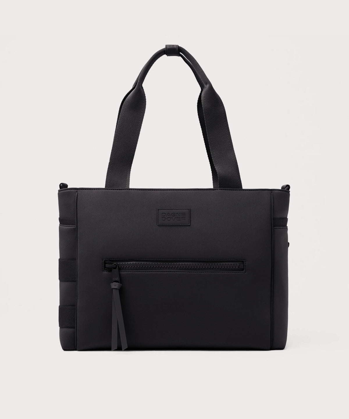 Dagne Dover large Wade Diaper Tote in black with the shoulder strap removed.
