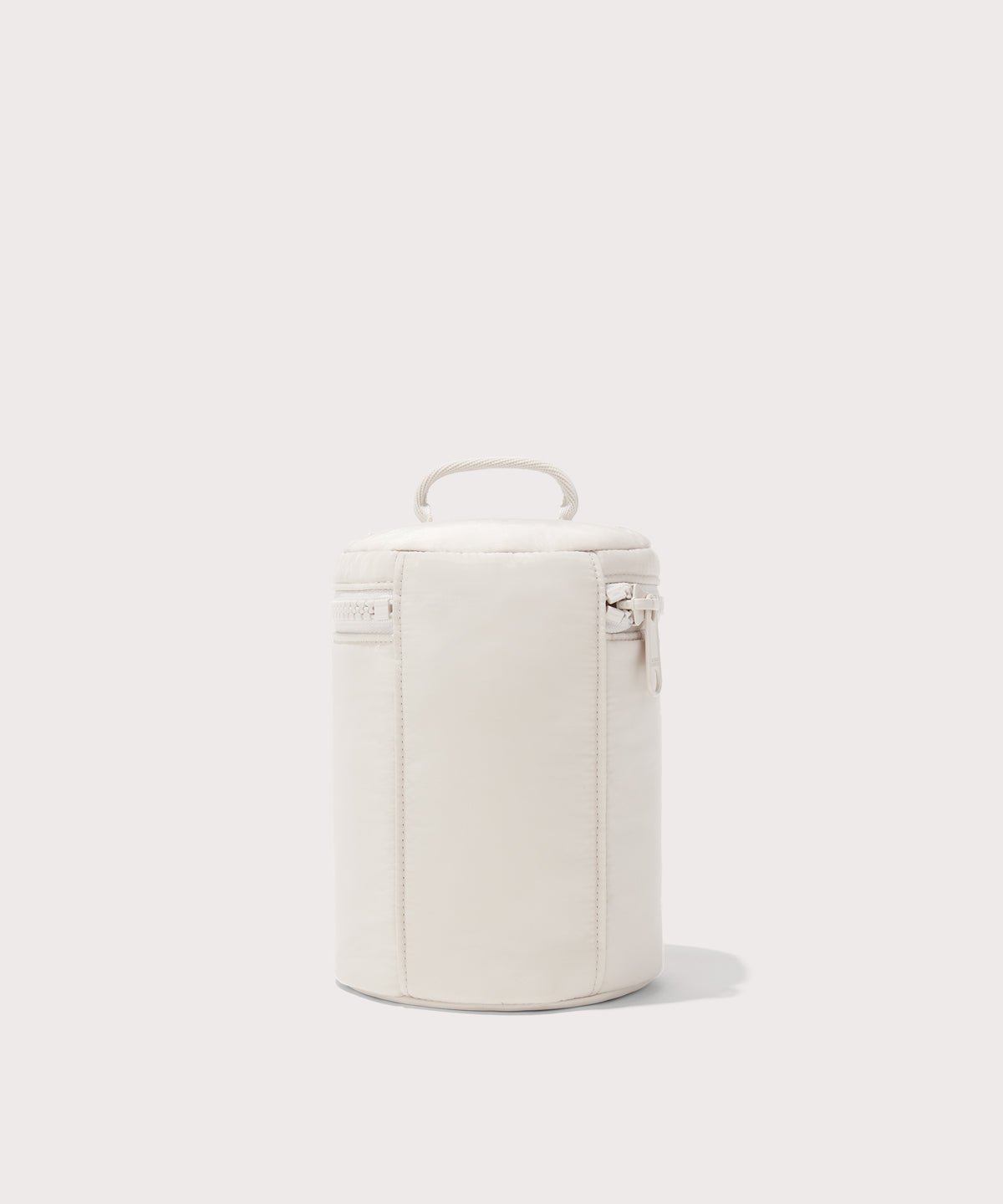 Dagne Dover large Mila Toiletry Pouch in white seen from the back.
