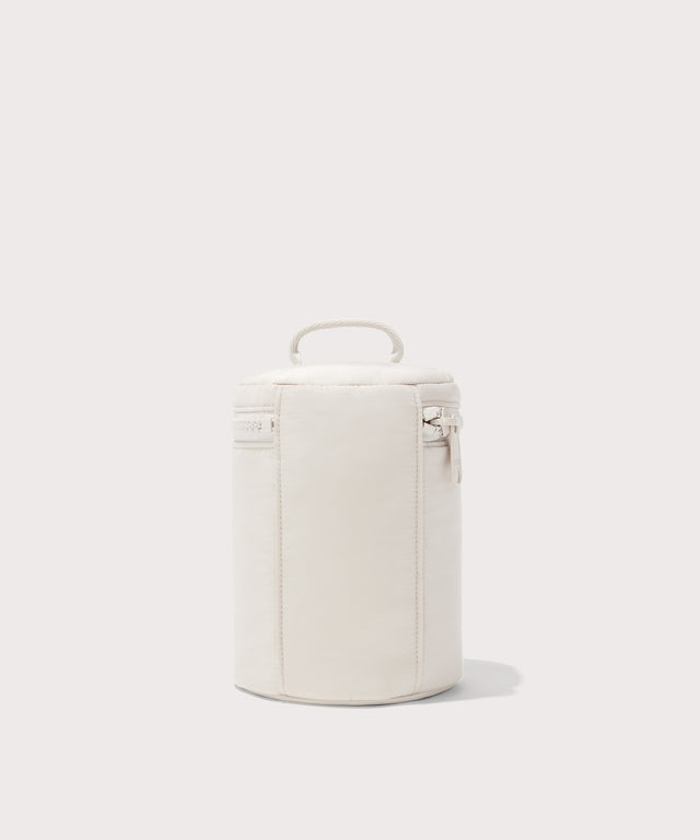 Dagne Dover large Mila Toiletry Pouch in white seen from the back.
