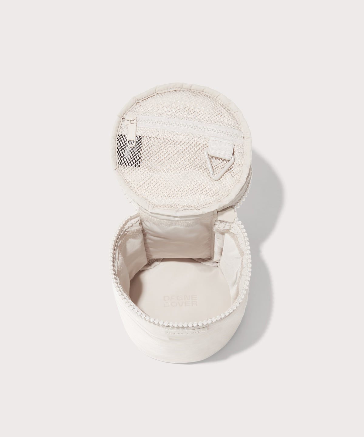Dagne Dover large Mila Toiletry Pouch in white unzipped.

