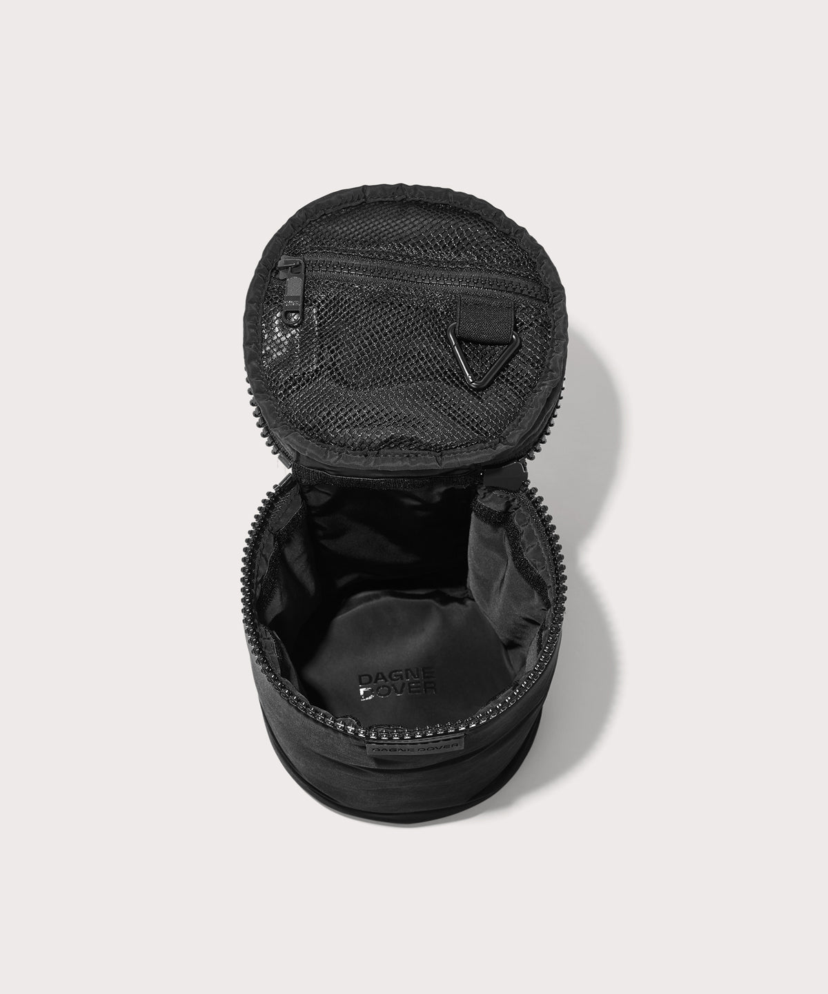 Dagne Dover large Mila Toiletry Pouch in black unzipped.
