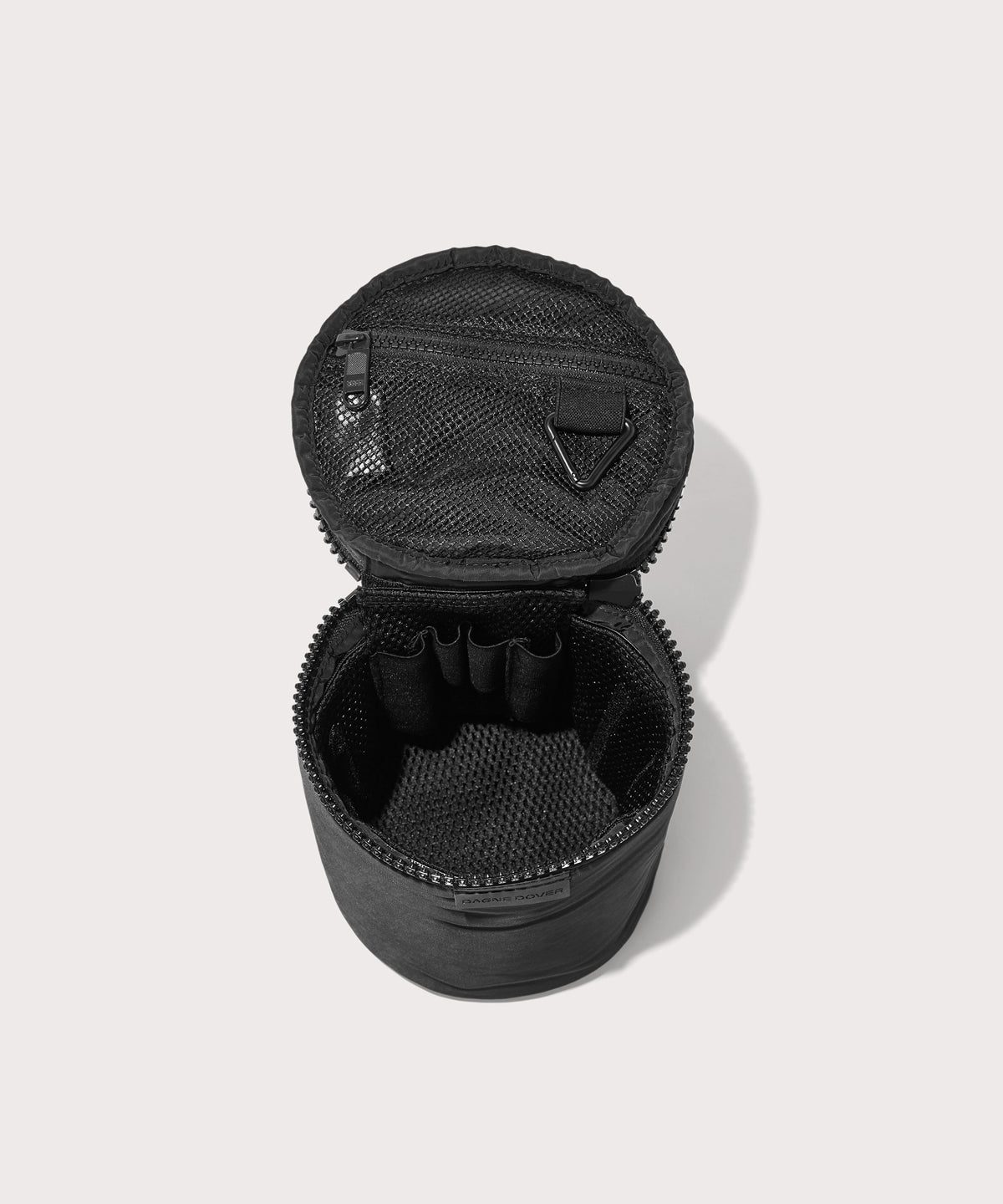 Dagne Dover large Mila Toiletry Pouch in black unzipped with the removable airmesh insert.
