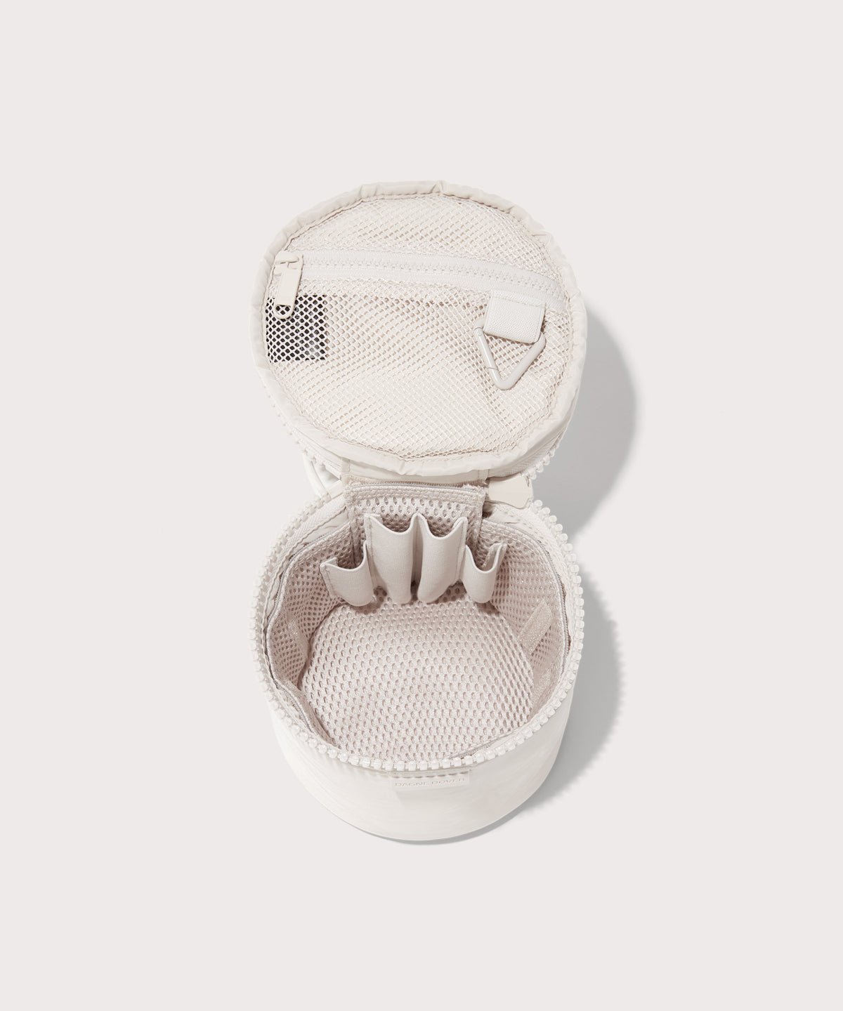 Dagne Dover small Mila Toiletry Pouch in white unzipped with the removable airmesh insert.