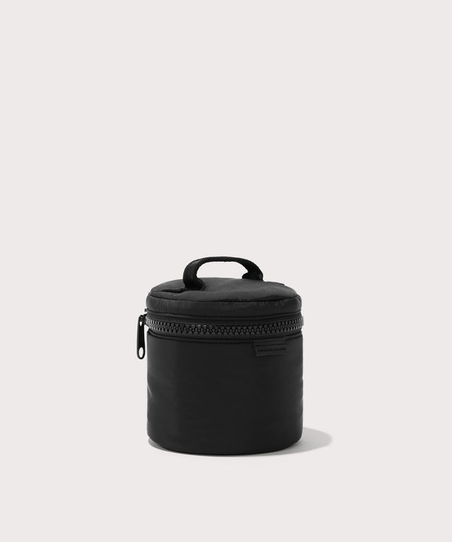 Dagne Dover small Mila Toiletry Pouch in black seen from an angle.
