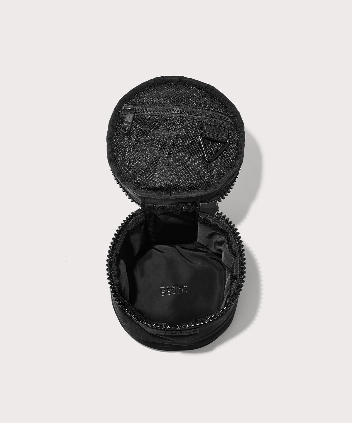 Dagne Dover small Mila Toiletry Pouch in black unzipped.
