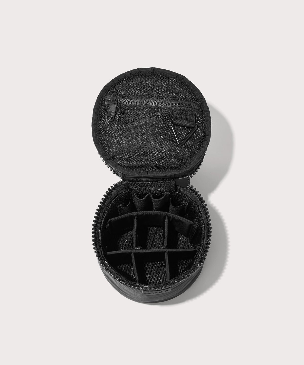 Dagne Dover small Mila Toiletry Pouch in black unzipped with the 6 adjustable compartments.