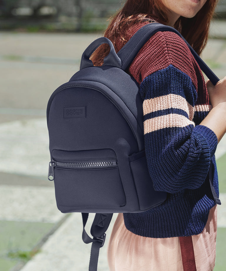 dagne dover mini backpack Small Indi Diaper Padded shoulder straps enhance the comfort of a classic laptop backpack crafted from sporty Neoprene Backpacks | Backpacks for