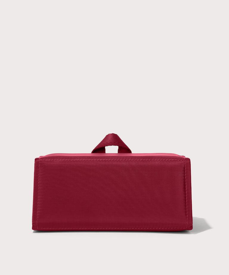 Dagne Dover Remi foldable glasses holder in spice red seen from the back.
