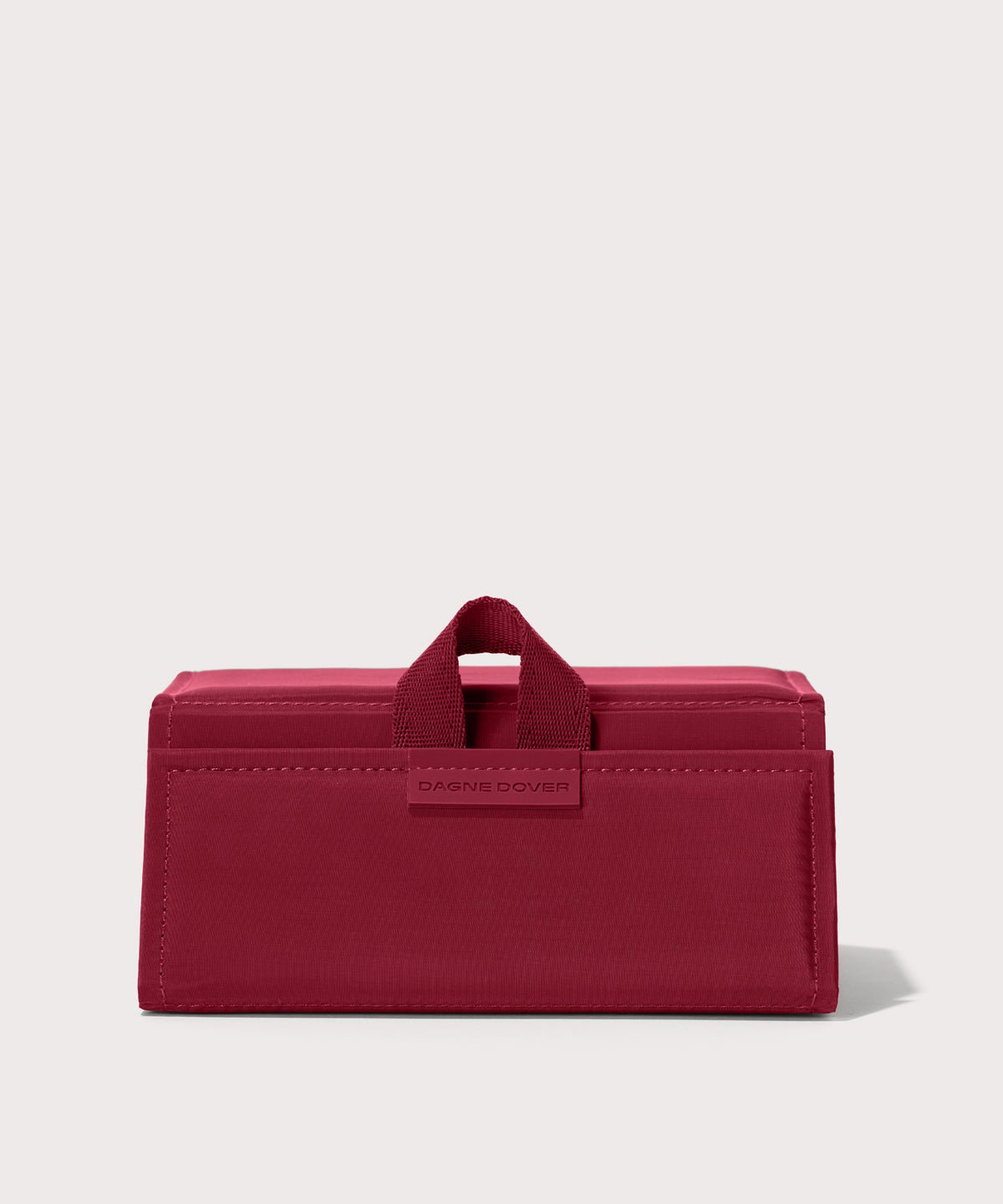 Dagne Dover Remi foldable glasses holder in spice red.
