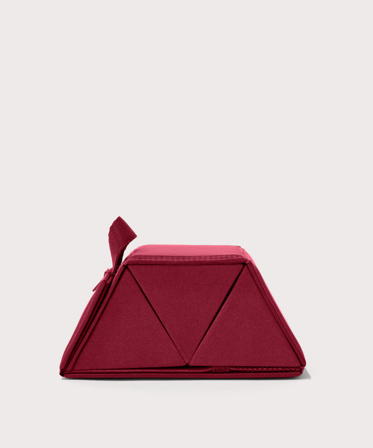 Dagne Dover Remi foldable glasses holder in spice red seen from the back.
