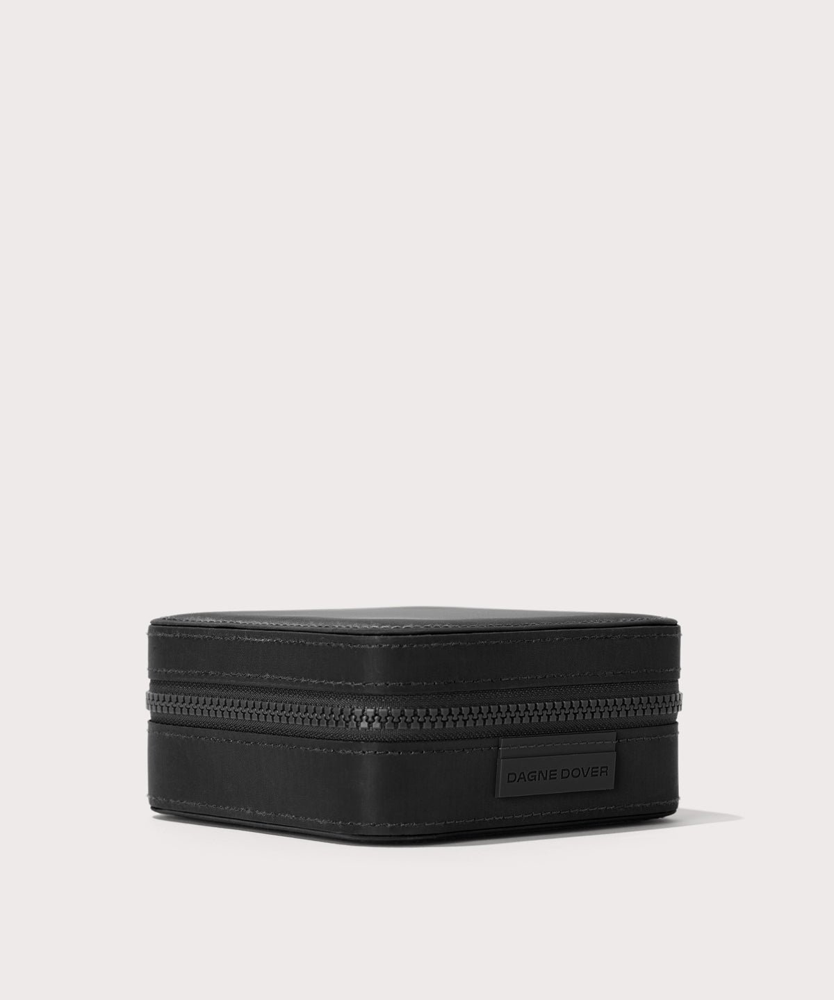 Dagne Dover Large Frankie Jewelry Case in black seen from an angle.
