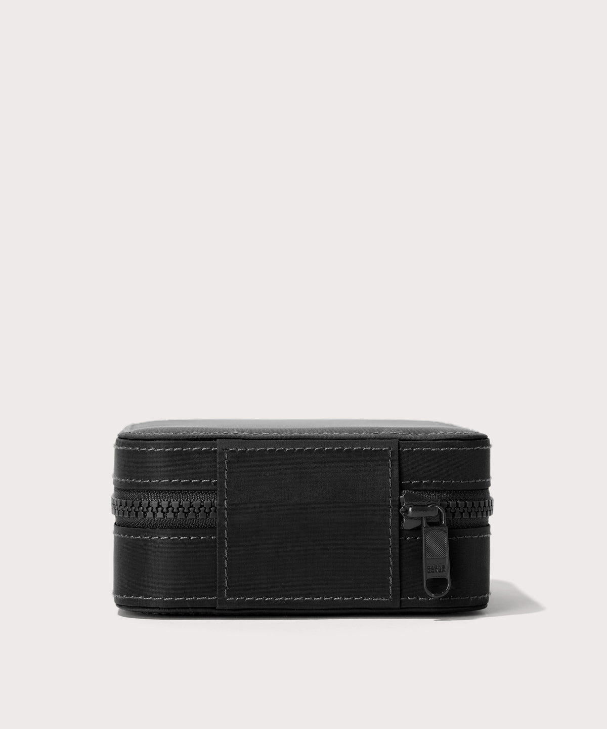 Dagne Dover Large Frankie Jewelry Case in black seen from the back.
