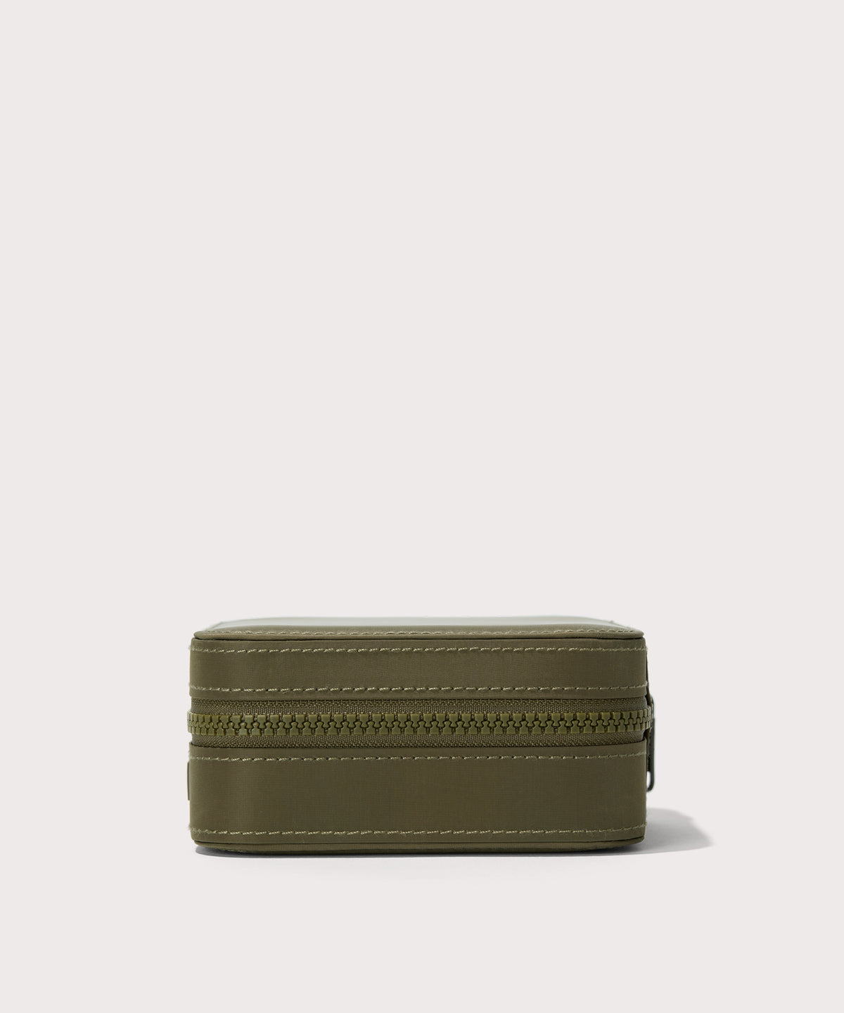 Dagne Dover Large Frankie Jewelry Case in dark green seen from a side.
