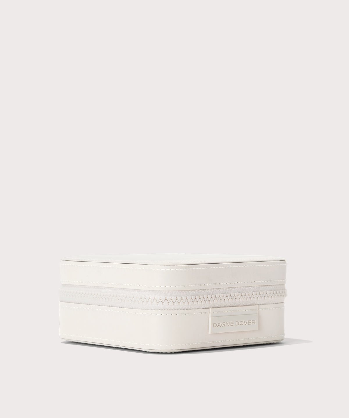 Dagne Dover Large Frankie Jewelry Case in white seen from the side.
