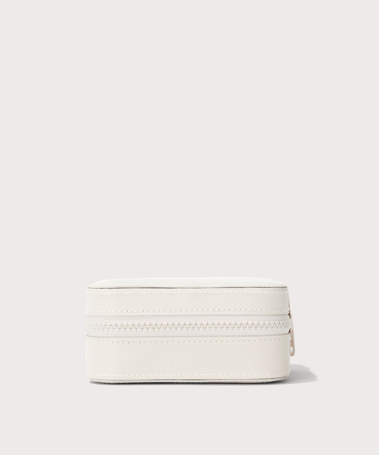 Dagne Dover Large Frankie Jewelry Case in white seen from a side.
