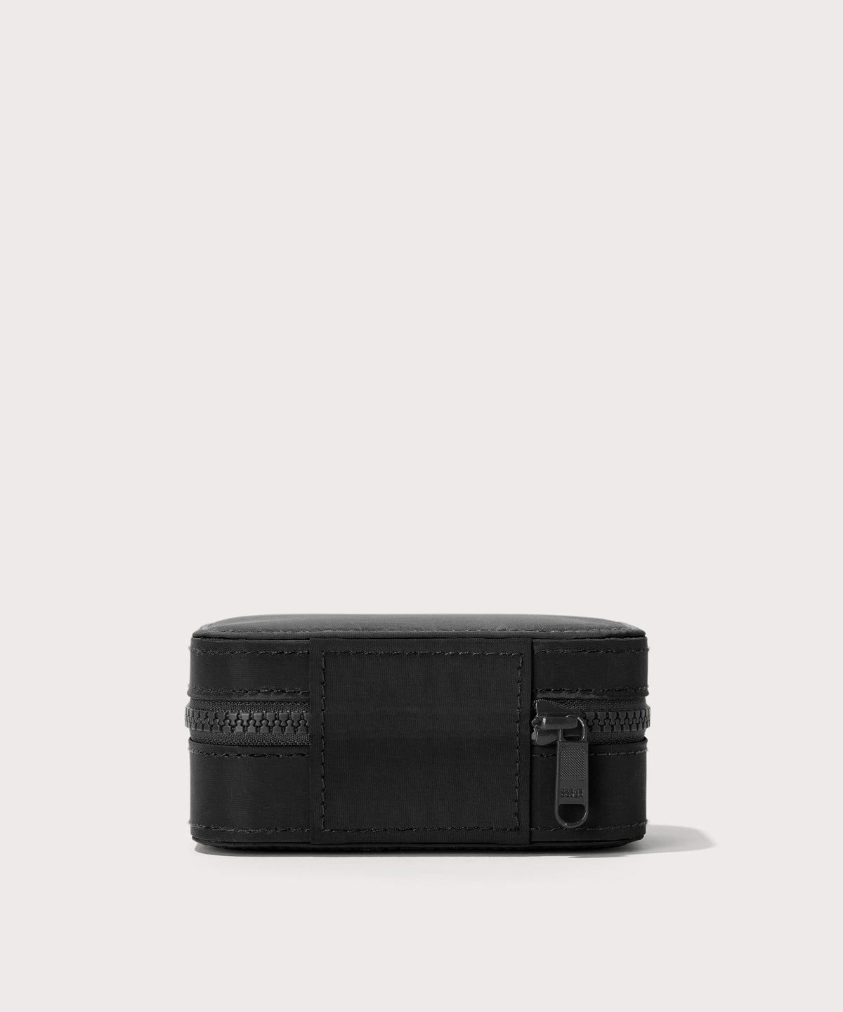 Dagne Dover small Frankie Jewelry Case in black seen from the back.
