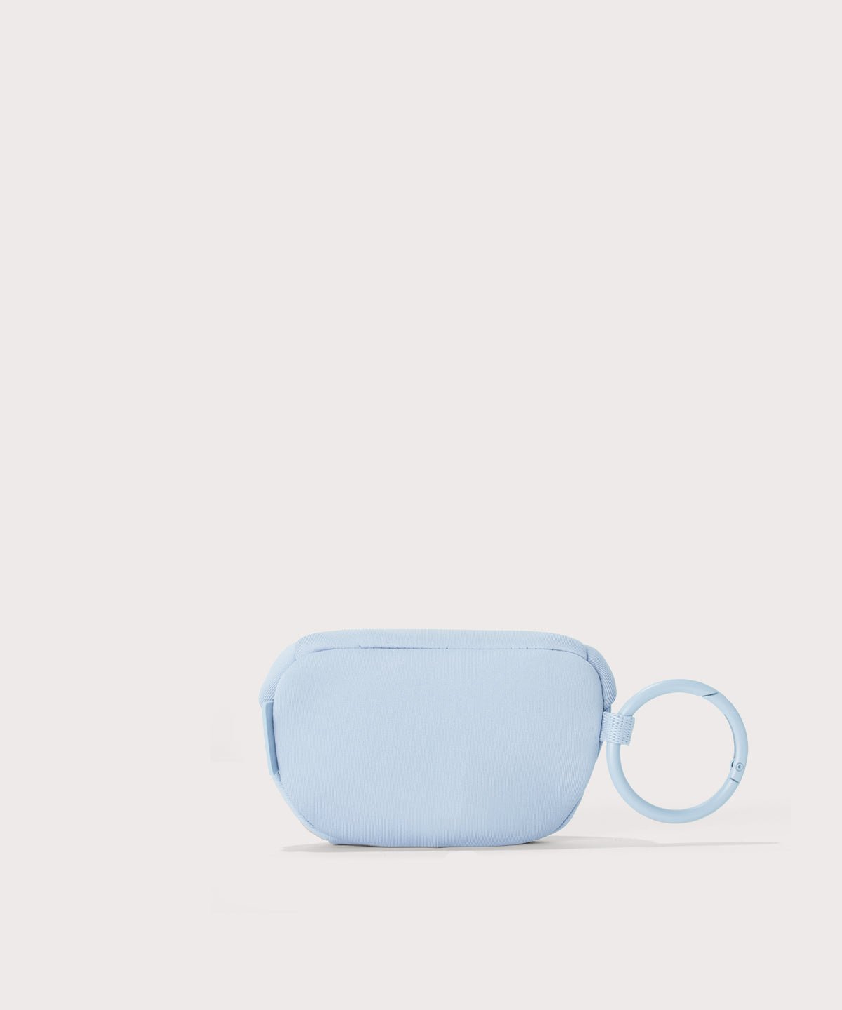 Dagne Dover Ace Keychain in an airy, lighter sky blue. seen from the back.
