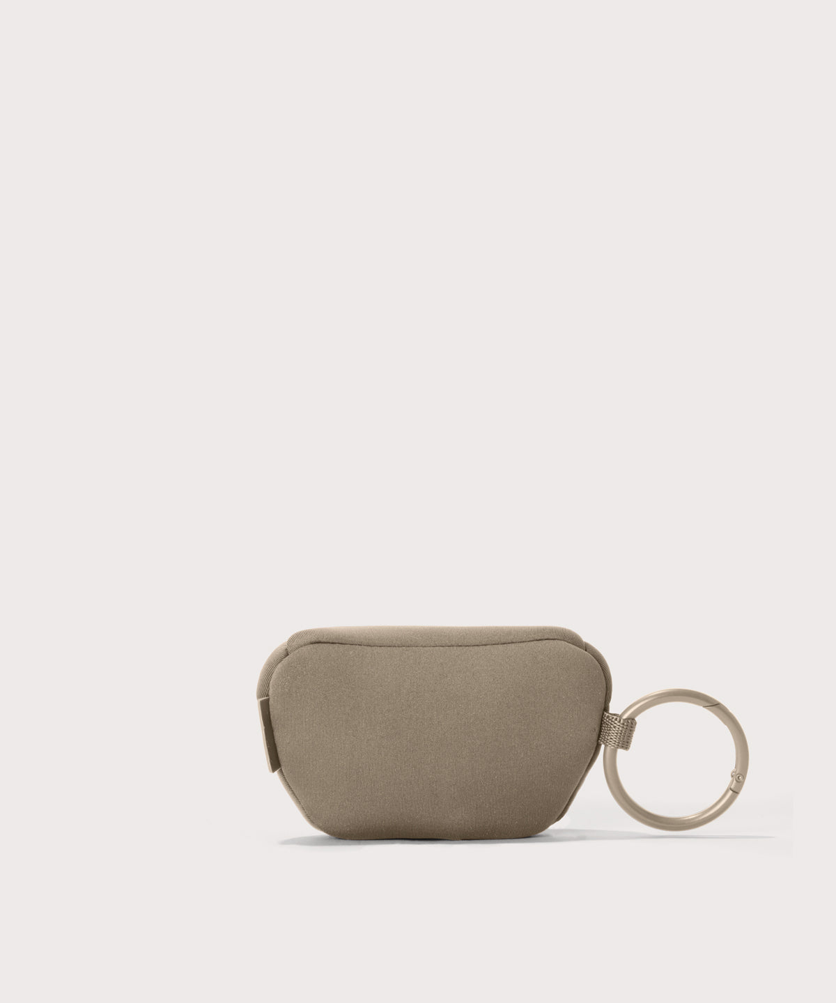 Dagne Dover Ace Keychain in a medium-dark, creamy tan seen from the back.
