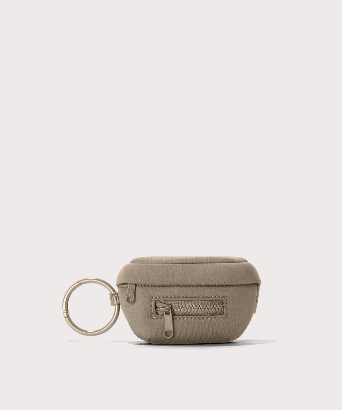 Dagne Dover Ace Keychain in a medium-dark, creamy tan.