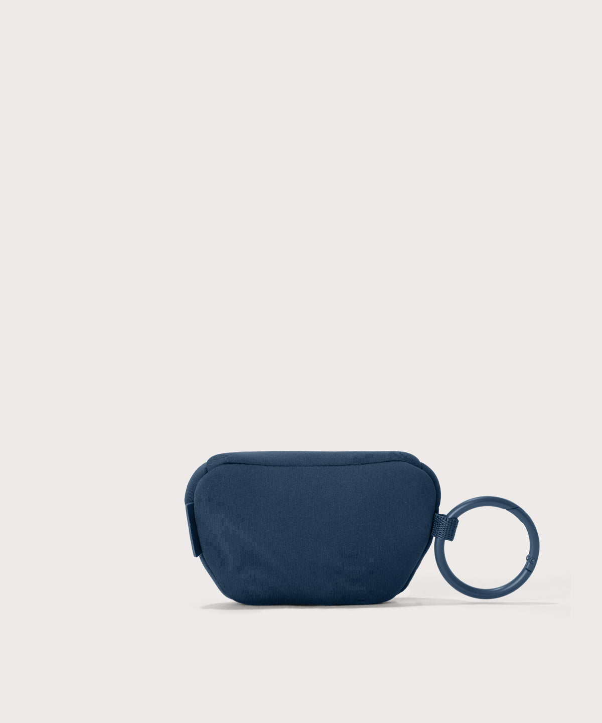 Dagne Dover Ace Keychain in a medium grey-blue with a touch of turquoise. seen from the back.
